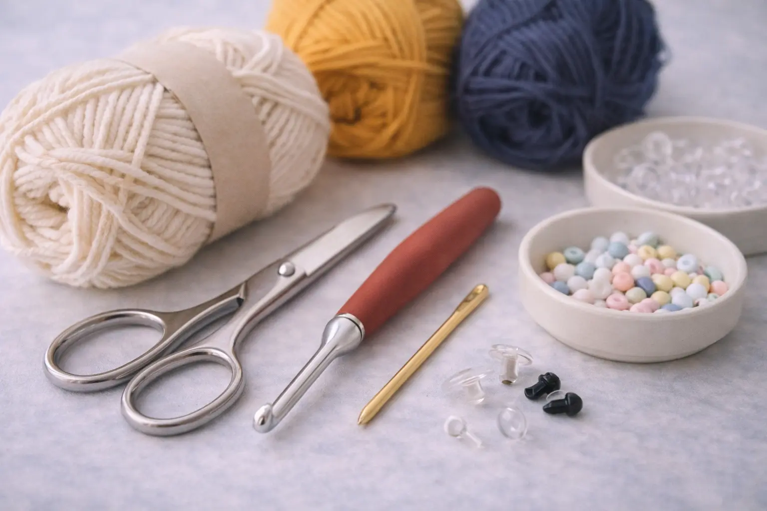 Close-up of safe rounded crochet tools and non-toxic yarn materials